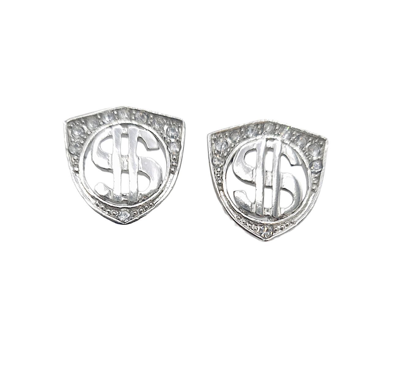 Dollarin korvakorut valkoisilla kivillä