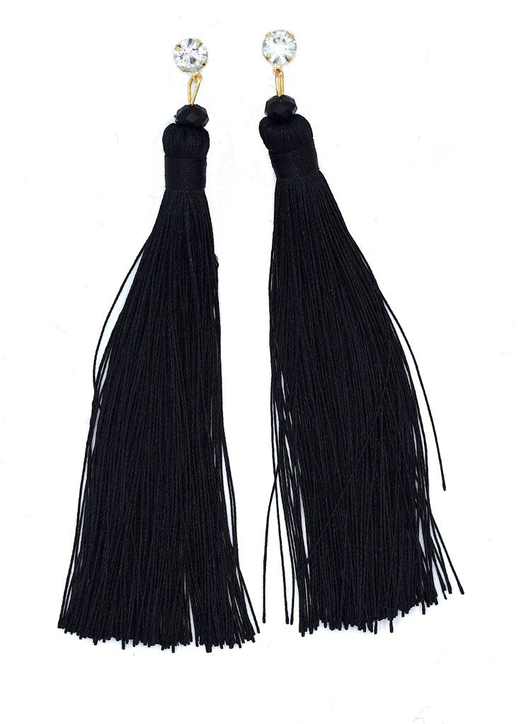 Hapsukorvakorut valkoisilla kristalleilla