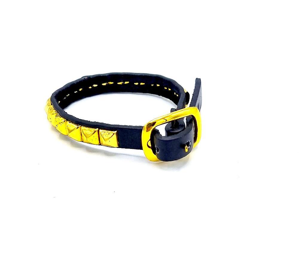 Leather bracelet with gold-colored pyramid studs