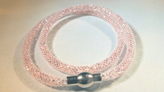 Double white bracelet filled with pink crystals