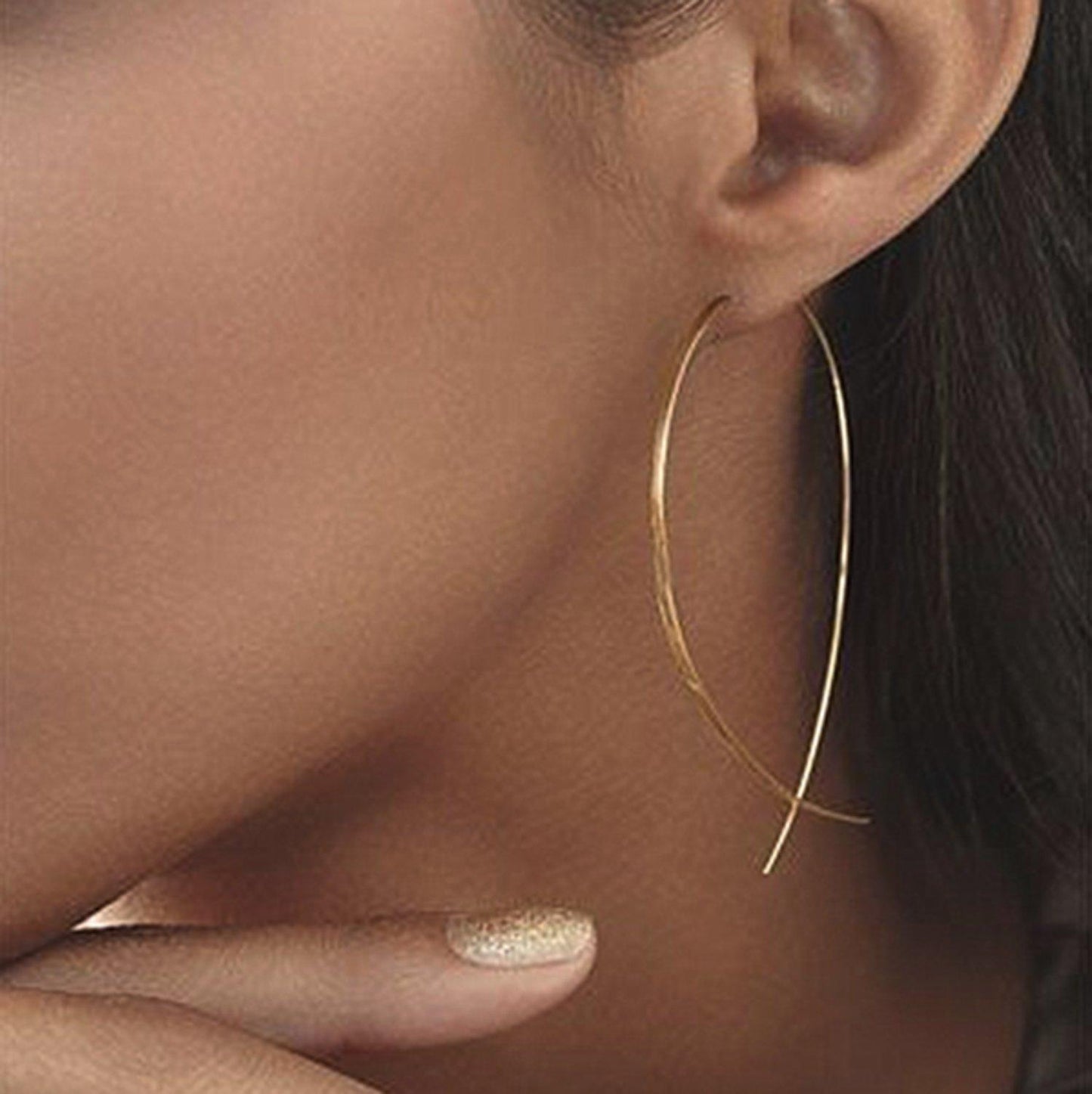 Fish-shaped earrings Gold-colored