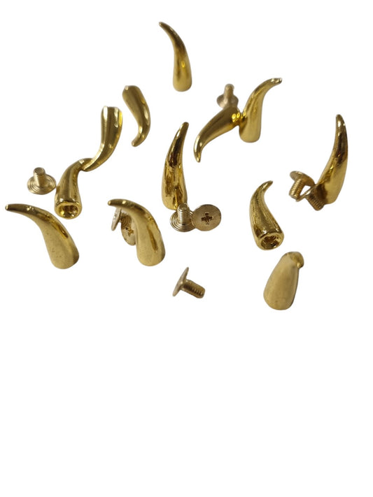 Gold colored curved rivets 