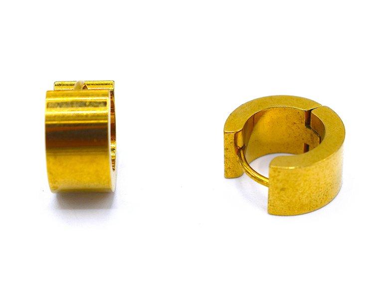 Kullanväriset korvakorut tukevat