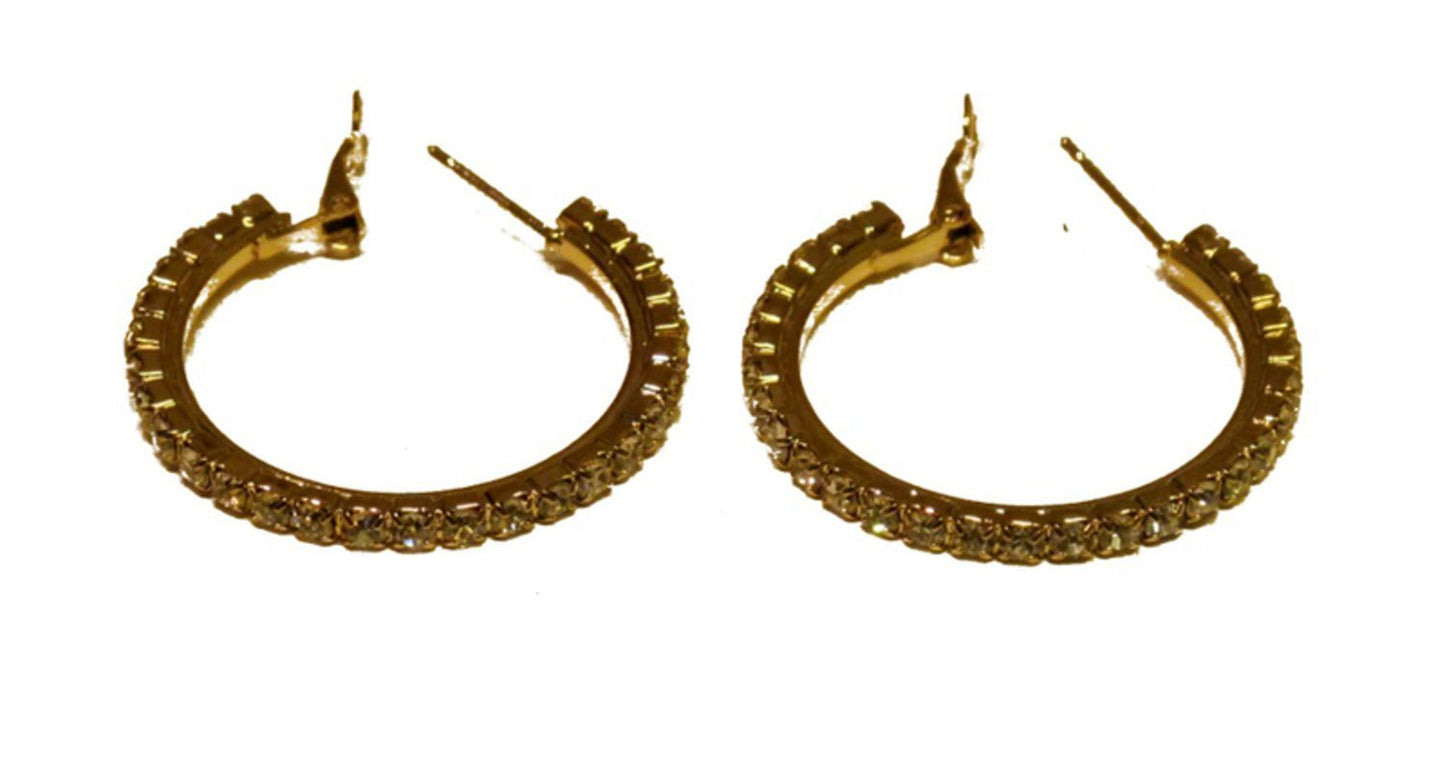 Round earrings with white stones