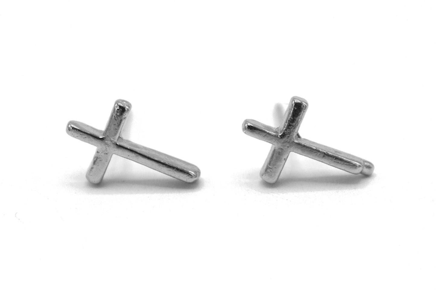 Silver colored cross earrings